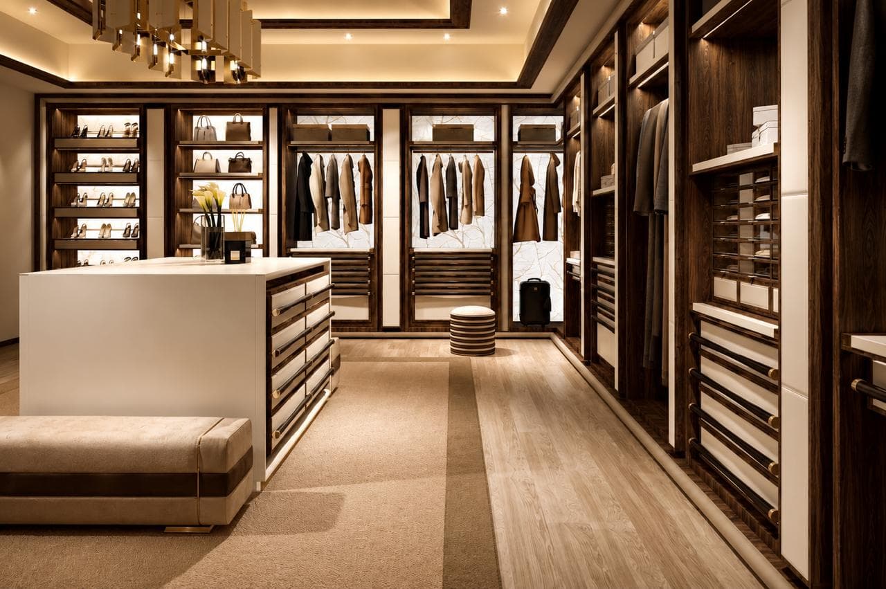 Luxury walk-in wardrobe with display shelves and central island